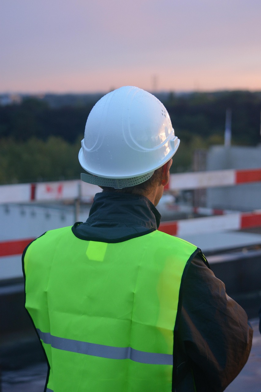 Pilot in high-visibility safety gear conducting an Advanced Flight Review for Drone Flight School Canada certification